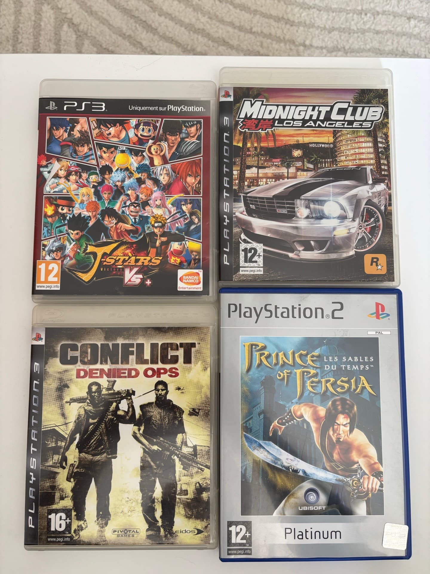 Lot de 4 jeux PS3 et PS2